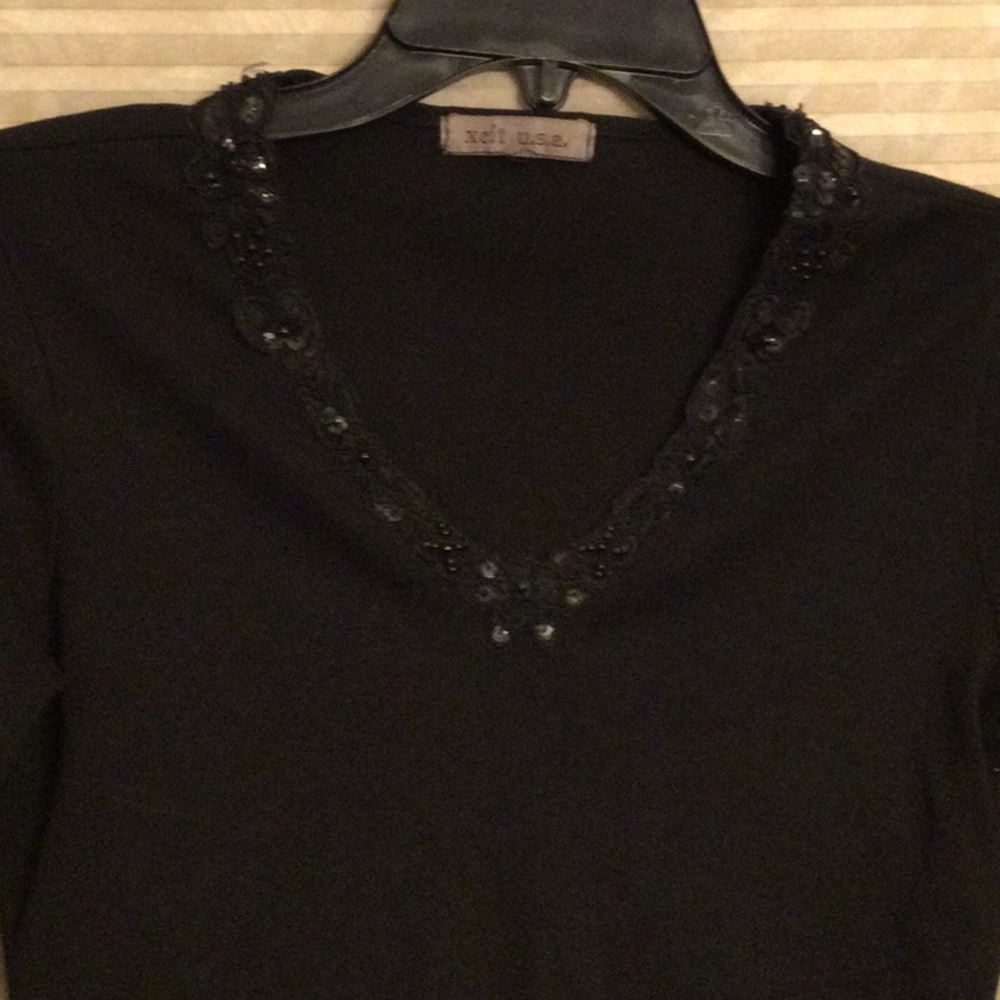 Black long sleeved v neck black lace embellished